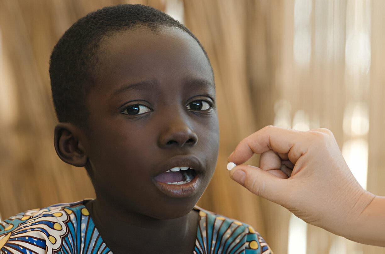 Child receiving medicine